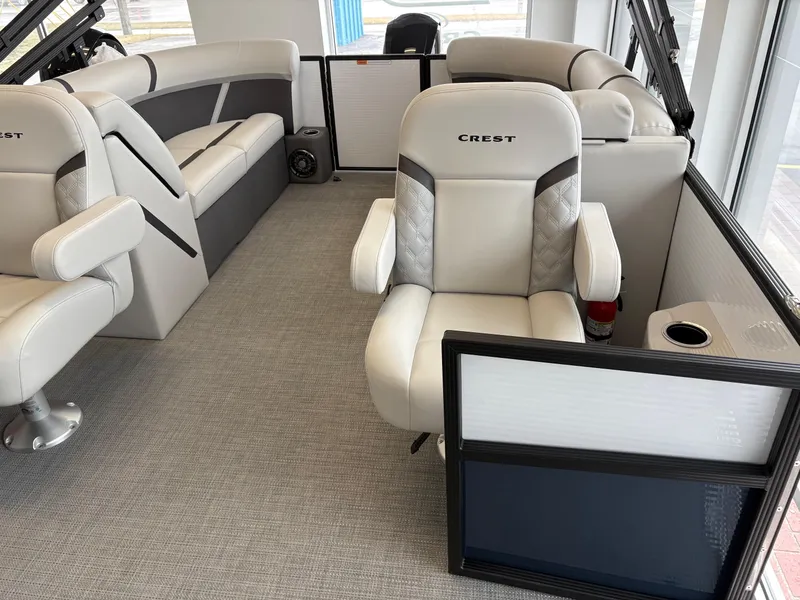 Slide: The Image of Luxurious interior of 2025 Crest 240SLC boat with plush seating and modern design. - 8