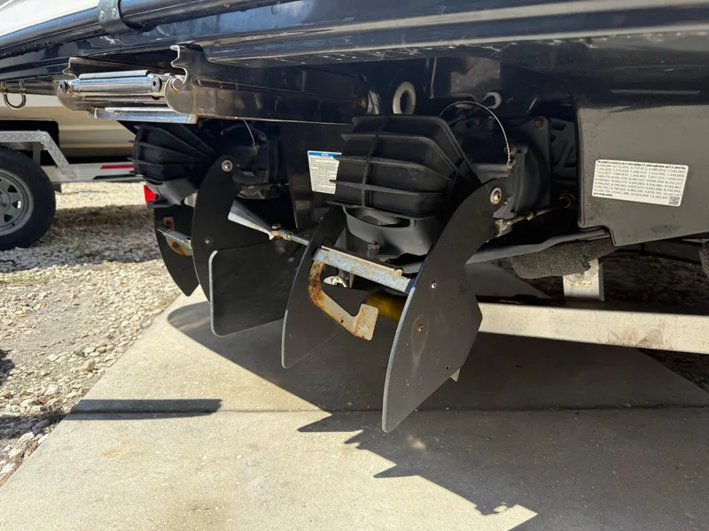 Slide: The Image of 2022 Yamaha Boats SX210 jet propulsion system close-up, showcasing dual impellers and nozzles. - 9