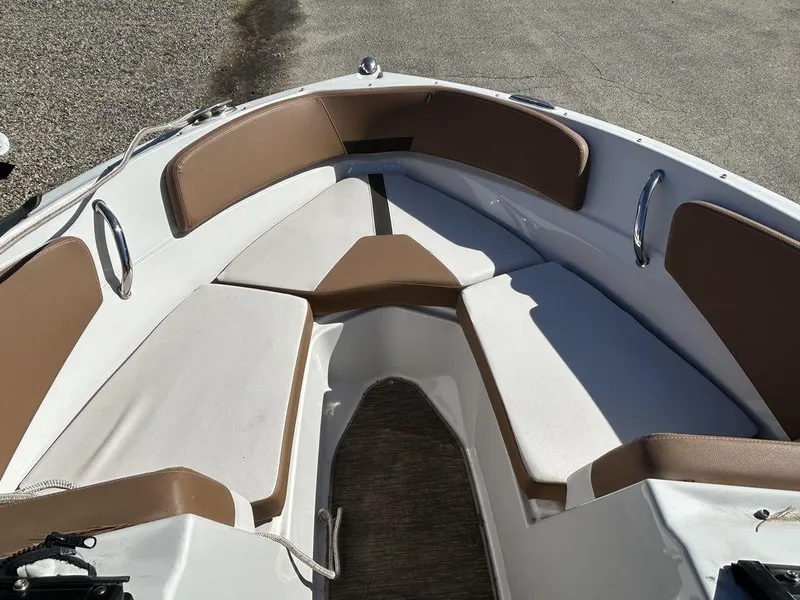 Slide: The Image of 2017 Four Winns Horizon 190 boat interior with cushioned seating. - 12