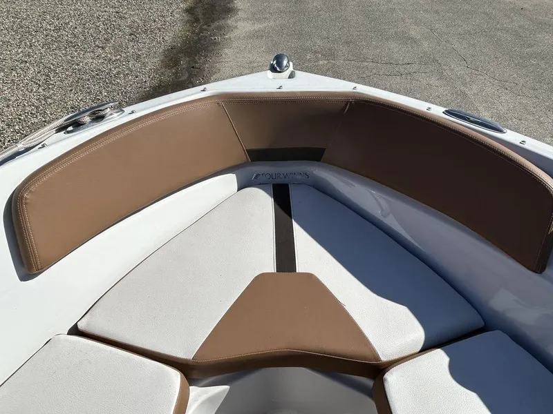 Slide: The Image of 2017 Four Winns Horizon 190 boat interior with brown and white seating. - 13