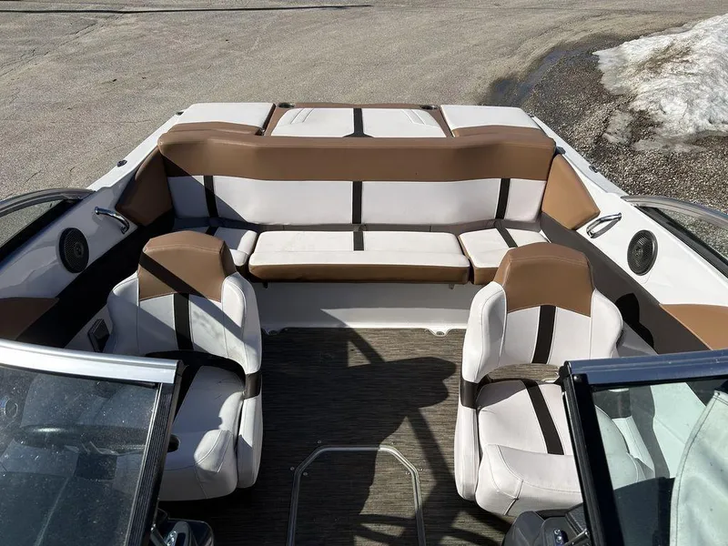 Slide: The Image of 2017 Four Winns Horizon 190 boat interior with brown and white seating. - 6