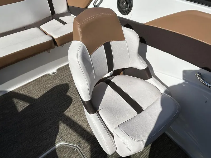 Slide: The Image of 2017 Four Winns Horizon 190 boat interior with cushioned seating and modern design. - 9
