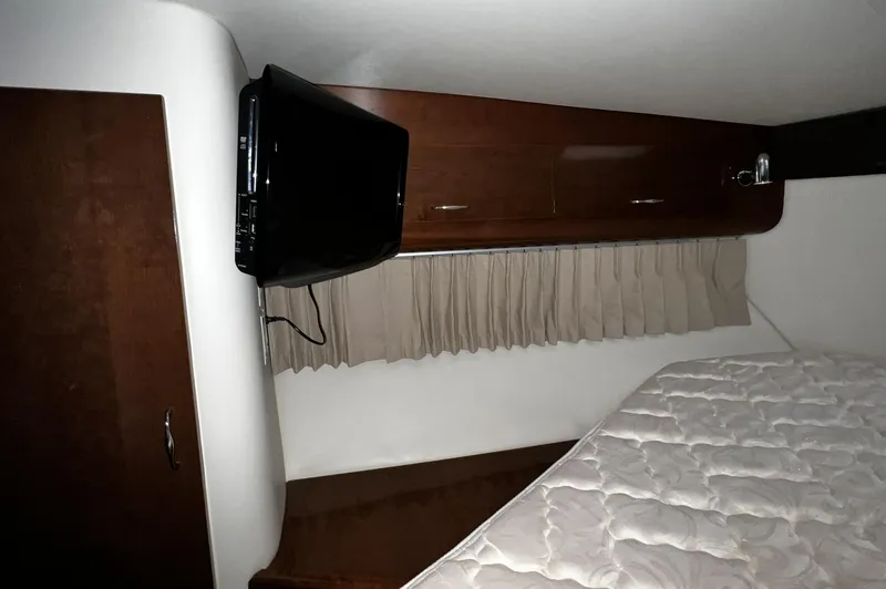 Slide: The Image of Interior cabin of 2008 Carver 36 Mariner with TV and bed. - 23