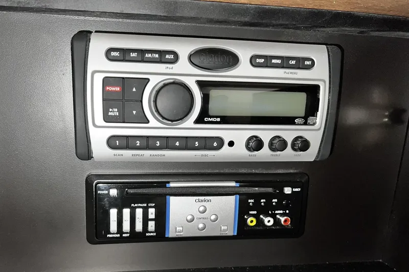 Slide: The Image of 2008 Carver 36 Mariner stereo system with control panel and audio inputs. - 28