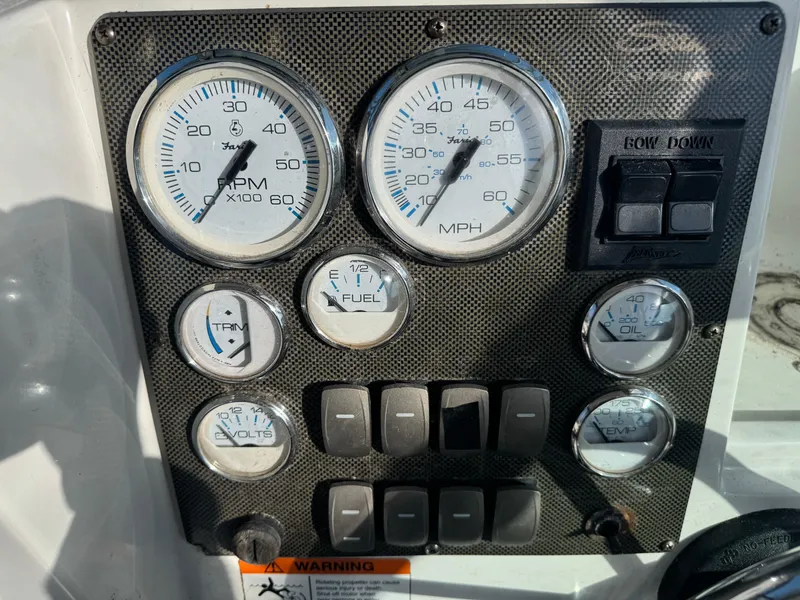 Slide: The Image of 2004 Seaswirl Striper 2601 Walkaround I/O boat cabin with compact marine toilet. - 18