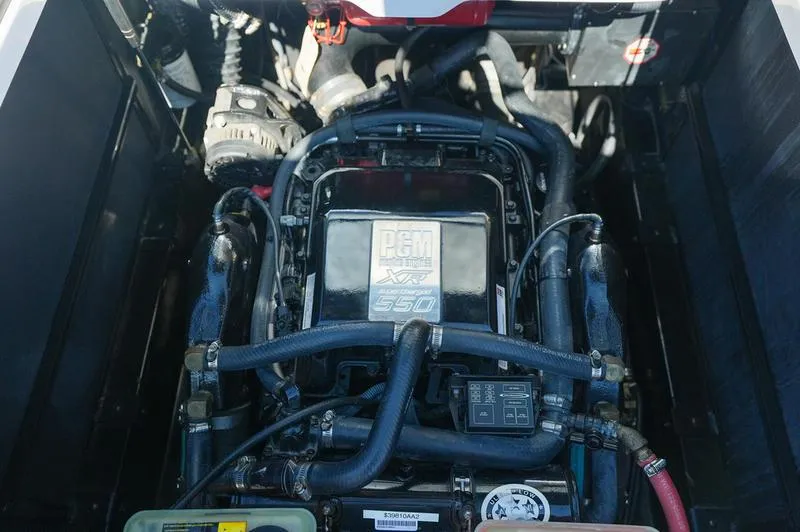 Slide: The Image of Engine of 2015 Nautique Super Air G23 boat, showcasing PCM 550 horsepower. - 13