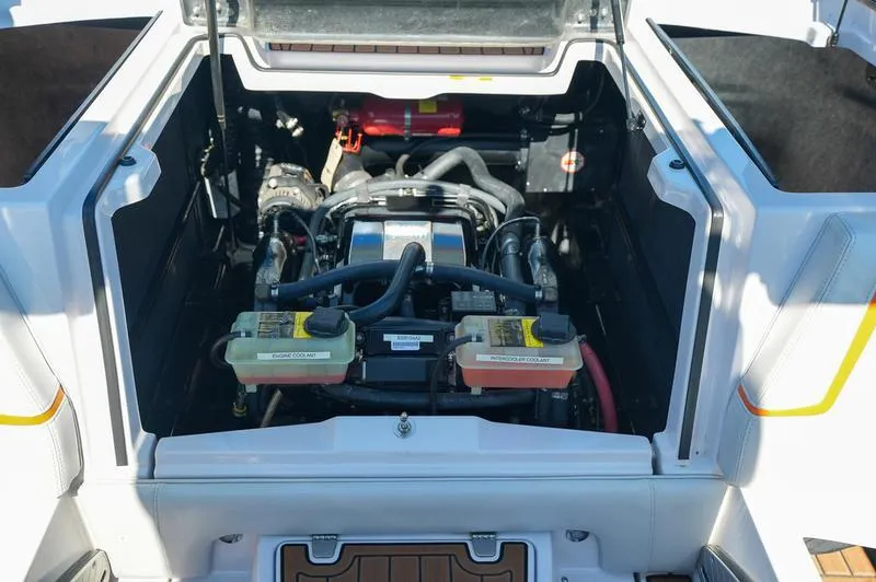 Slide: The Image of 2015 Nautique Super Air G23 engine compartment, showcasing detailed mechanical components. - 14