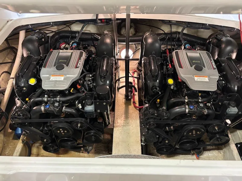 Slide: The Image of Twin engines in a 2012 Formula 290 Bowrider boat, showcasing powerful performance. - 17