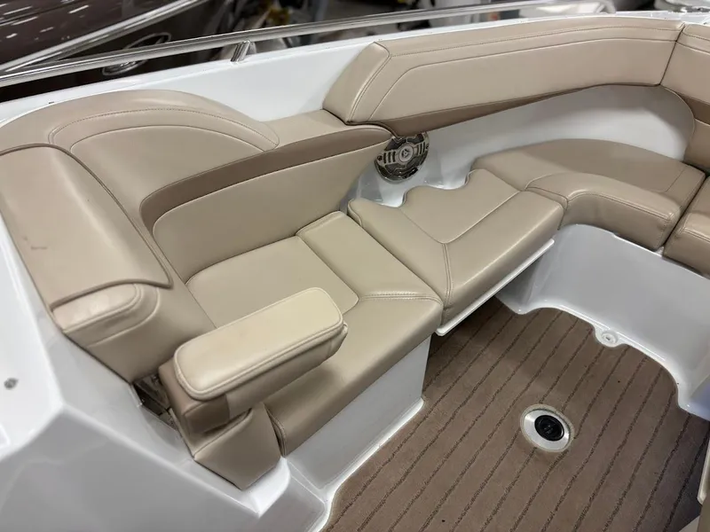 Slide: The Image of 2012 Formula 290 Bowrider interior with beige seating and armrest, showcasing luxury design. - 27