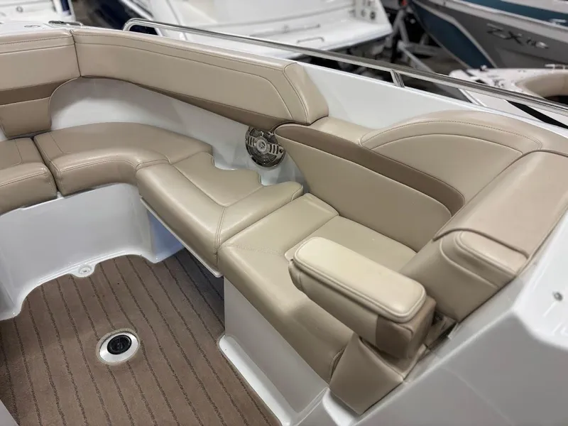 Slide: The Image of Luxurious seating on 2012 Formula 290 Bowrider boat with beige upholstery and wood-textured flooring. - 28