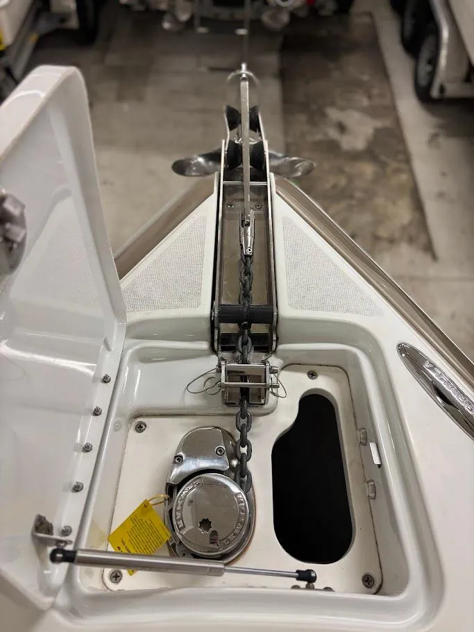 Slide: The Image of 2012 Formula 290 Bowrider anchor compartment with chain and winch system. - 29