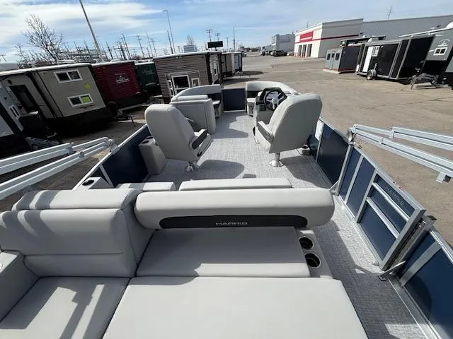 Slide: The Image of 2025 Harris Cruiser 210 SLDH pontoon boat with spacious seating and modern design. - 13