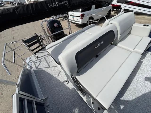 Slide: The Image of 2025 Harris Cruiser 210 SLDH pontoon boat with spacious seating and modern design. - 19