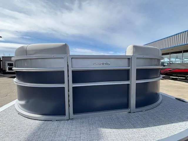 Slide: The Image of 2025 Harris Cruiser 210 SLDH pontoon boat, sleek design, outdoor display. - 24