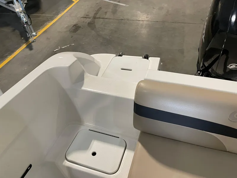 Slide: The Image of 2021 Hurricane SunDeck Sport 201 OB boat interior with seating and storage compartment. - 29