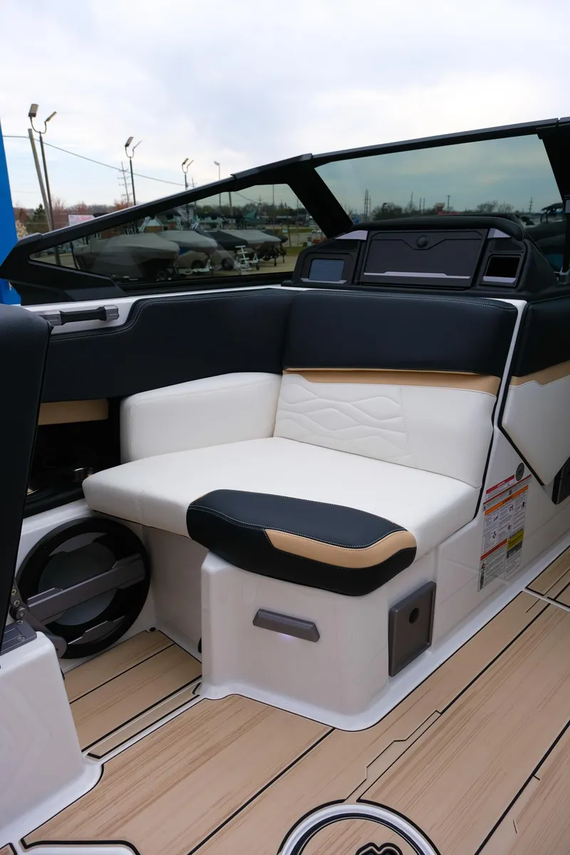 Slide: The Image of 2025 Supra SE450 boat interior with sleek seating and modern design. - 18