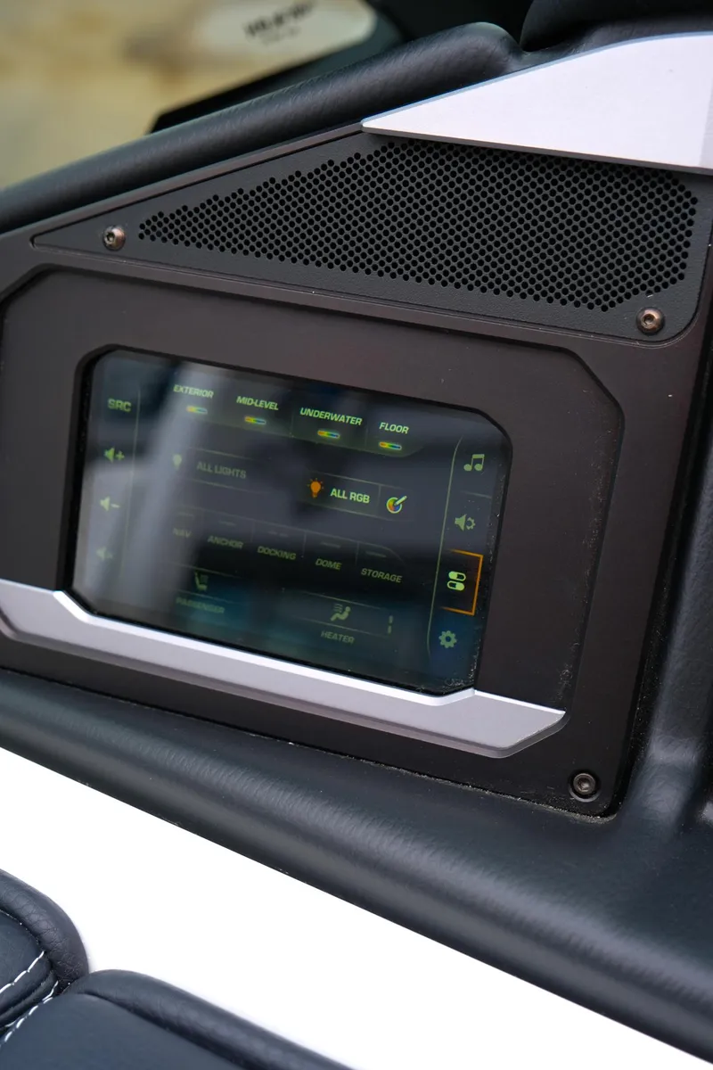 Slide: The Image of 2025 Supra SE450 dashboard touchscreen displaying controls and settings. - 26