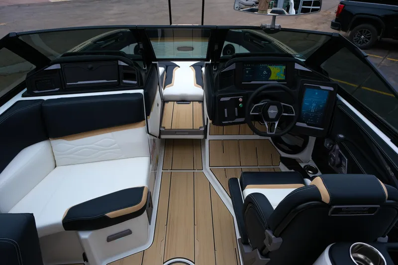 Slide: The Image of 2025 Supra SE450 boat interior with modern dashboard and luxurious seating. - 27