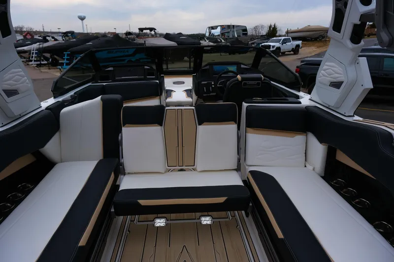 Slide: The Image of 2025 Supra SE450 boat interior with luxurious seating and modern design. - 28