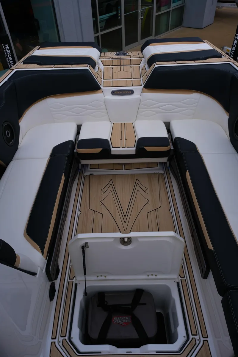 Slide: The Image of 2025 Supra SE450 boat interior with luxurious seating and storage compartments. - 31