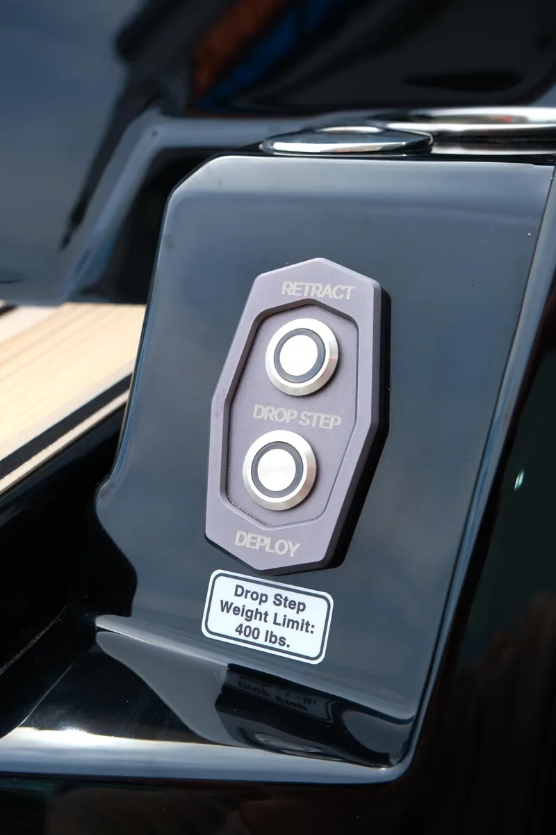 Slide: The Image of Control panel for Supra SE450 2025 boat's retractable drop step, weight limit 400 lbs. - 8
