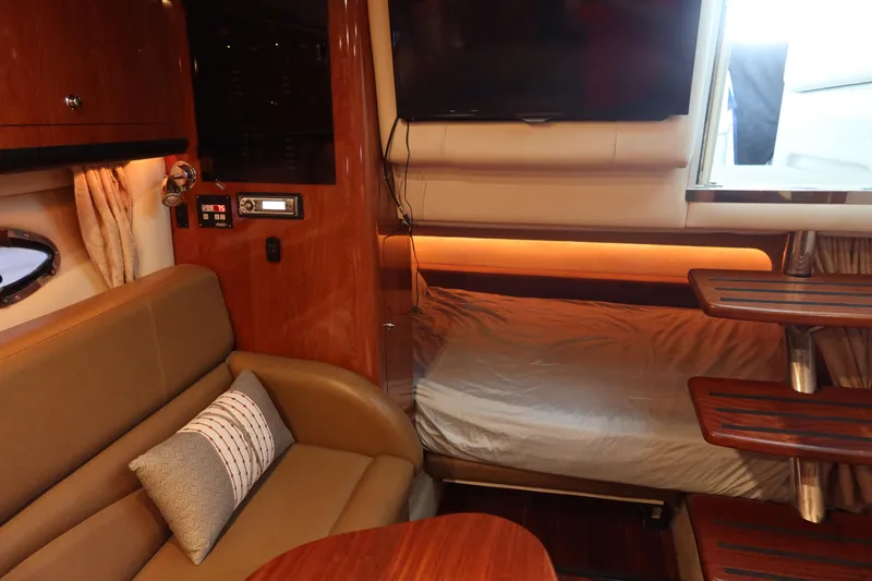 Slide: The Image of Interior of 2009 Crownline 340 CR yacht with cozy seating and modern amenities. - 26