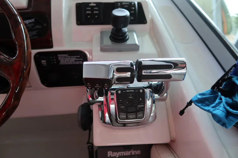 Slide: The Image of Control panel of a 2009 Crownline 340 CR boat with Raymarine equipment. - 29