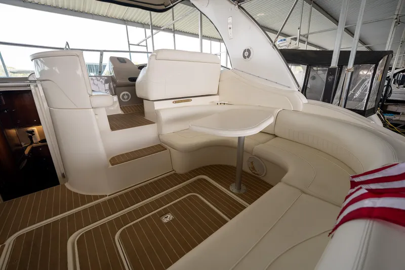 Slide: The Image of Luxurious 2004 Cruisers Yachts 370 Express interior with elegant seating and table. - 36