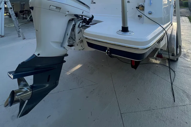 Slide: The Image of 2020 Regal 26 XO boat stern with outboard motor and swim platform. - 9