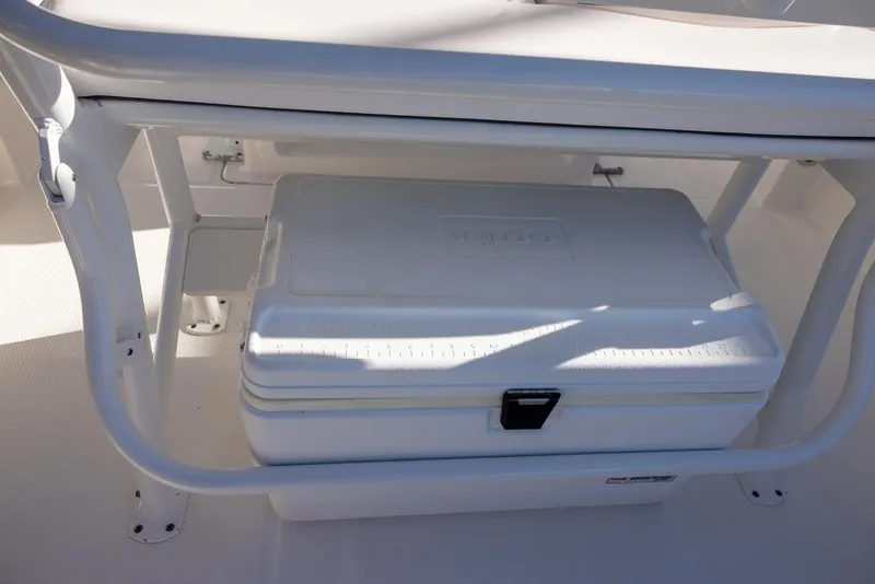Slide: The Image of 2020 Robalo R230 Center Console with integrated cooler storage under seat. - 7