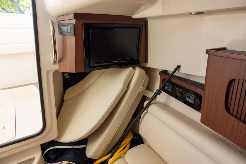 Slide: The Image of 2024 Grady-White Freedom 375 interior with TV and seating area. - 21