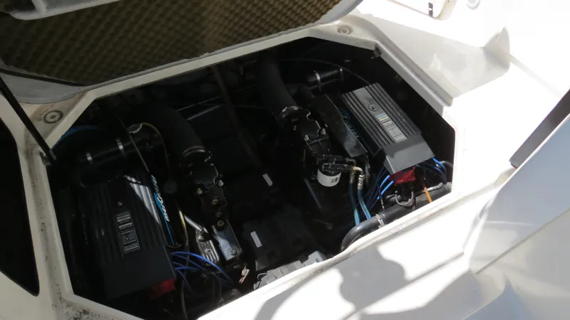 Slide: The Image of 1998 Doral 300 SC V Drive engine compartment with dual engines visible. - 37