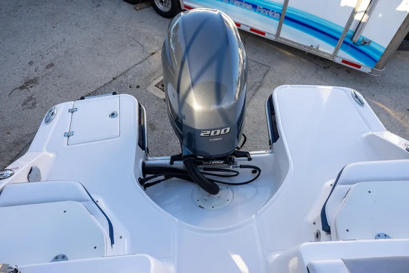 Slide: The Image of 2020 Chaparral 230 Suncoast boat with Yamaha 200 engine, rear view. - 15