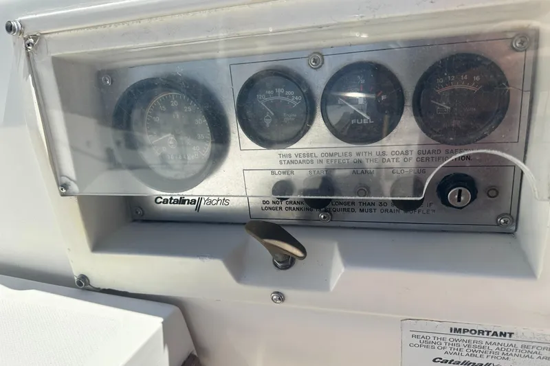 Slide: The Image of Dashboard of a 1988 Catalina 30 yacht with gauges and controls. - 4