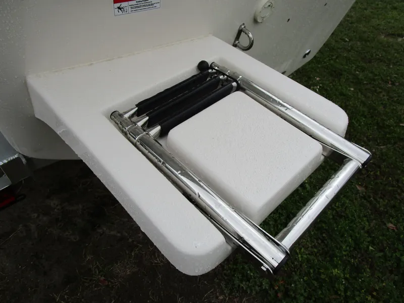 Slide: The Image of 2025 Carolina Skiff LS Series 17LS boat ladder on white platform. - 4