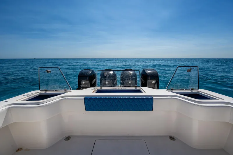 Slide: The Image of 2020 Front Runner 39 boat with four engines, ocean view, clear sky. - 14