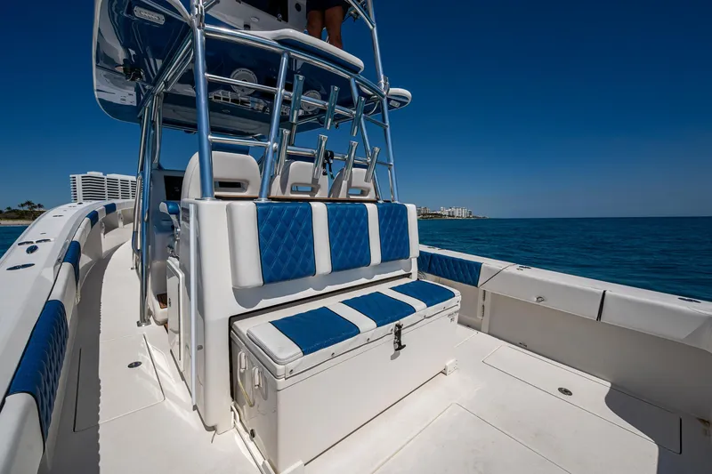Slide: The Image of 2020 Front Runner 39 boat with blue and white seating, ocean view. - 15