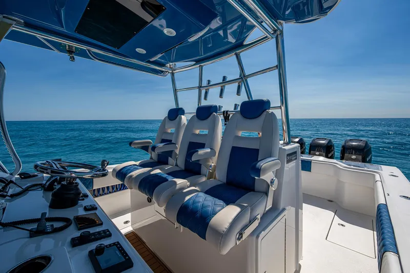 Slide: The Image of Luxury seating on a 2020 Front Runner 39 boat, with ocean view and clear sky. - 27