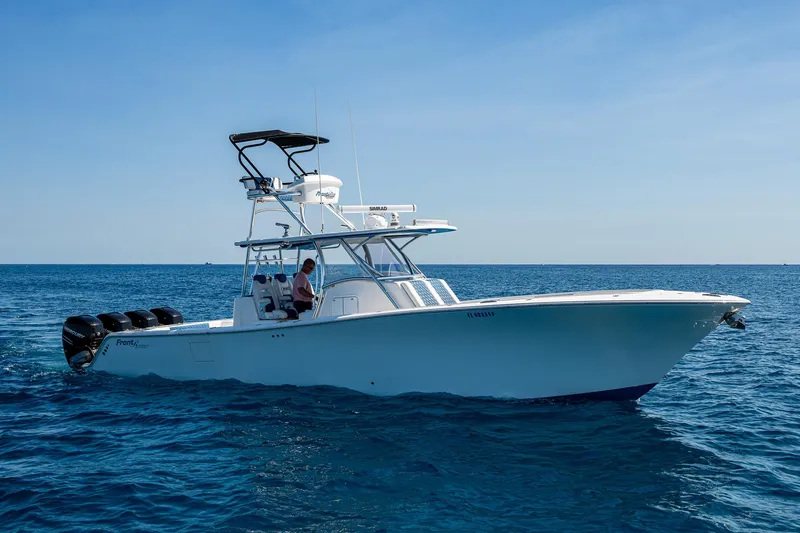 Slide: The Image of 2020 Front Runner 39 boat cruising on open blue sea. - 37