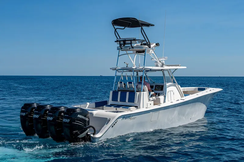 Slide: The Image of 2020 Front Runner 39 boat with four engines cruising on open sea. - 41