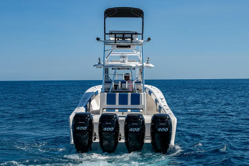 Slide: The Image of 2020 Front Runner 39 boat with four 400 horsepower engines on open sea. - 43