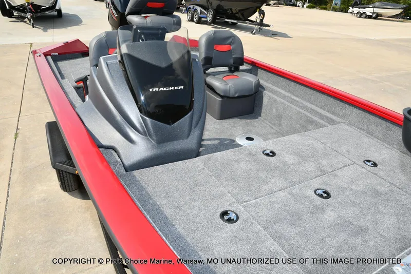 Slide: The Image of 2025 Tracker Pro Team 175 Crappie Edition boat with red trim and gray interior. - 29