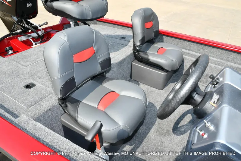 Slide: The Image of 2025 Tracker Pro Team 175 Crappie Edition boat interior with gray and red seating. - 30