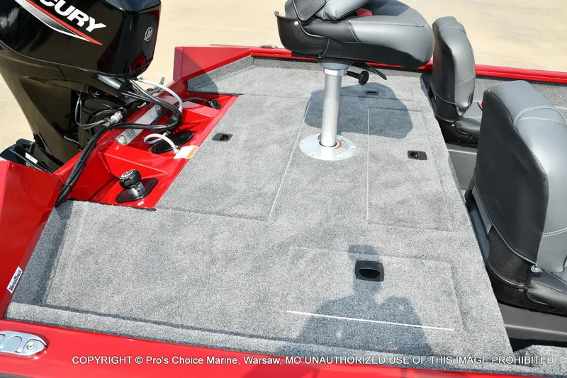 Slide: The Image of 2025 Tracker Pro Team 175 Crappie Edition boat interior with seating and motor. - 31