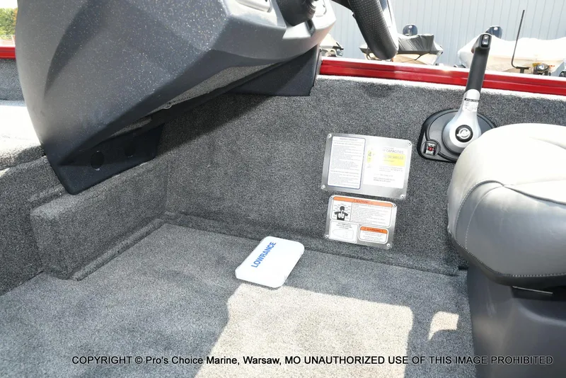 Slide: The Image of Interior of 2025 Tracker Pro Team 175 Crappie Edition boat, featuring control panel and seating. - 39