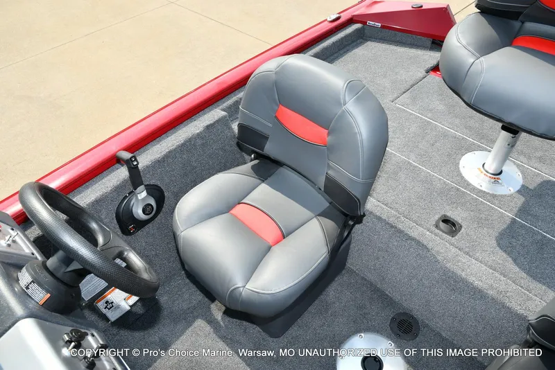 Slide: The Image of 2025 Tracker Pro Team 175 Crappie Edition boat interior with gray and red seating. - 48