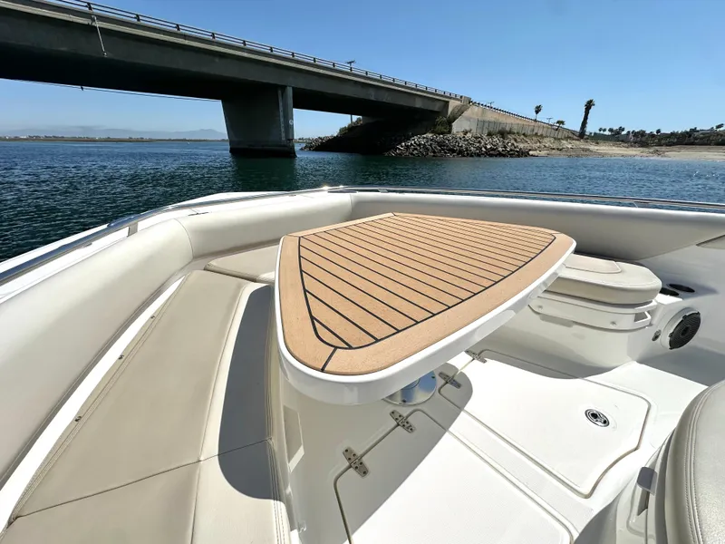 Slide: The Image of 2020 Boston Whaler 420 Outrage boat interior with bridge view. - 14