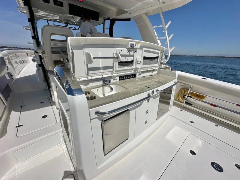 Slide: The Image of Boston Whaler 420 Outrage 2020 boat interior with sleek design and modern amenities. - 32