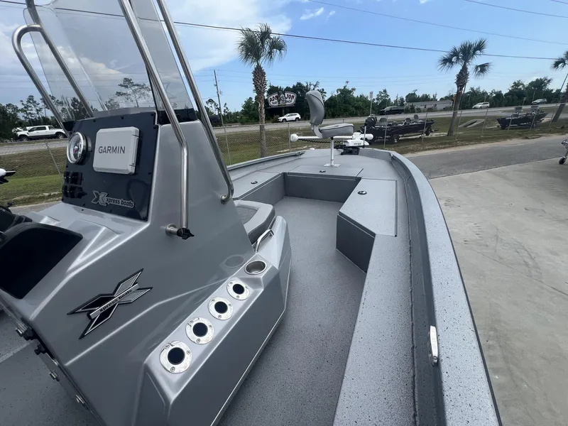 Slide: The Image of 2025 Xpress Hyper-Lift Series H22B boat with Garmin system, sleek design, and spacious deck. - 12
