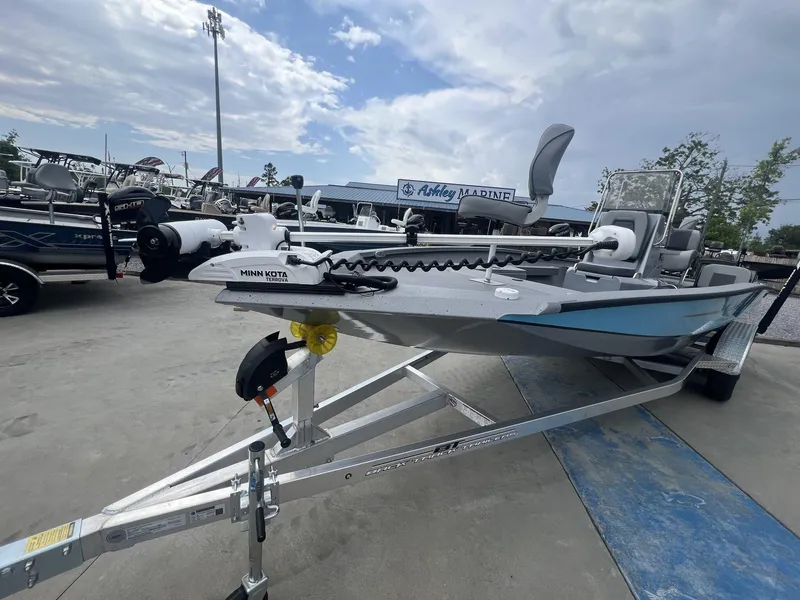 Slide: The Image of 2025 Xpress Hyper-Lift Series H22B boat on trailer, featuring Minn Kota Terrova motor. - 4